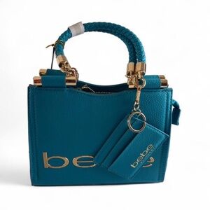 Bebe Fabiola Top Handle Crossbody Capri Blue with Gold Hardware.